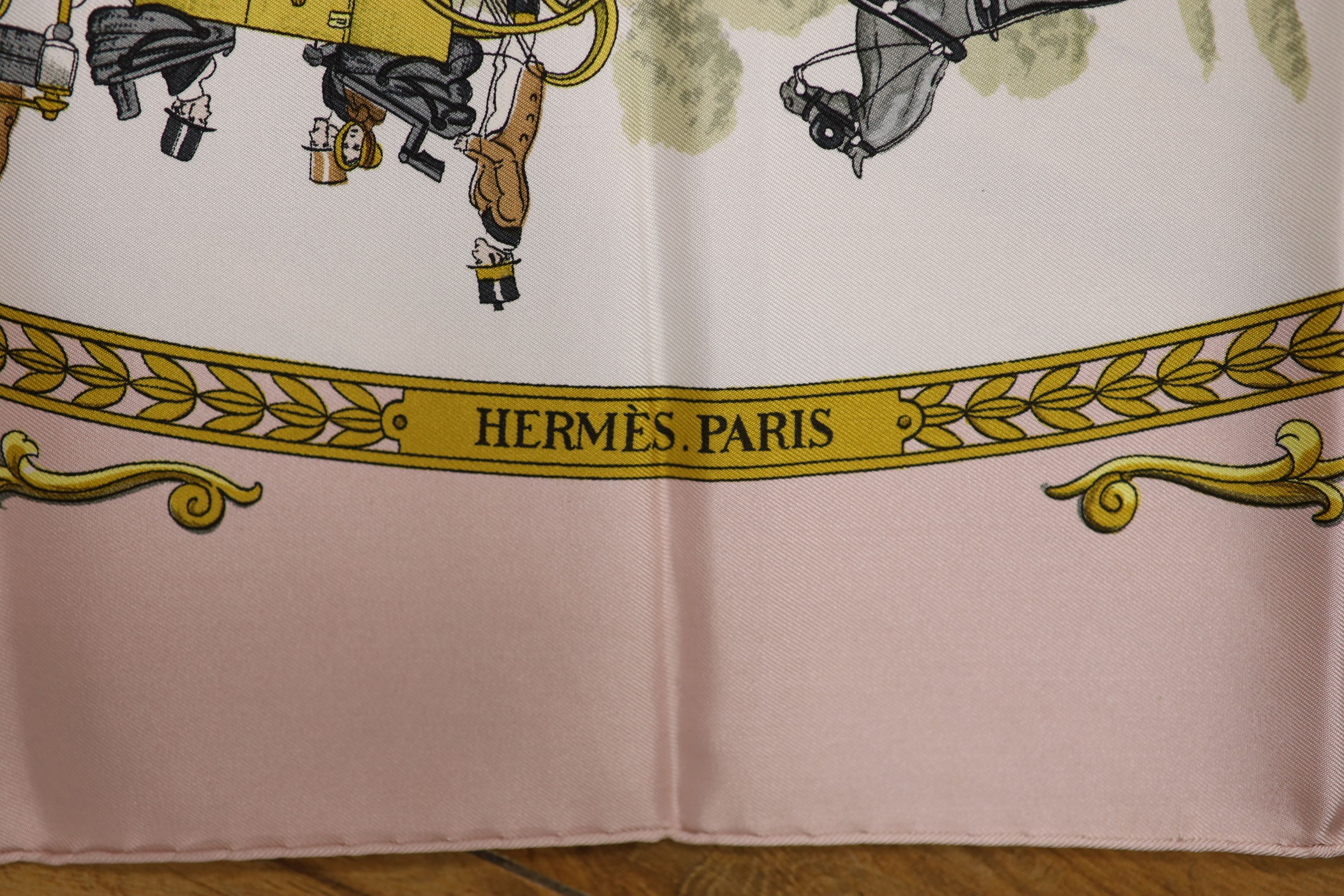 Two Hermes silk scarves - 'La Promenade de Longchamp' designed by Philippe Ledoux, first issued in 1965, with slip case, the other 'The Tarot'